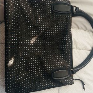 Mantainance leather studded bag